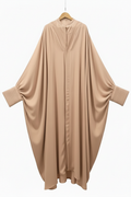 BARE AUTHORITY nude beige batwing abaya on white background